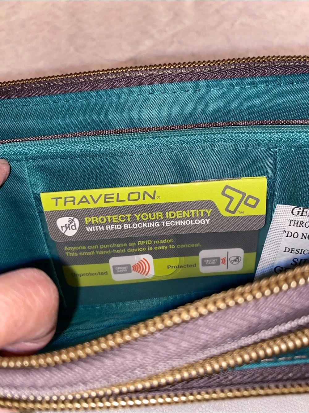 Travelon quilted Wristlet Wallet -RFID blocking to protect cards and ID.